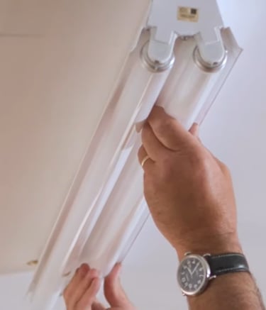 putting a fluorescent lamp in its proper position