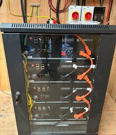 Pylontech US5000 lithium batteries in a cabinet