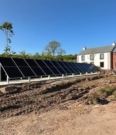 off grid home with 18 bi facial solar panels on a ground mount array
