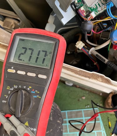 diagnosing split system air conditioner outdoor unit PCB with digital multimeter