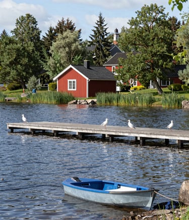 a man riding a skateboard down a street next to tall buildings