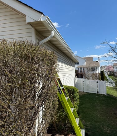 attaching downspout to home