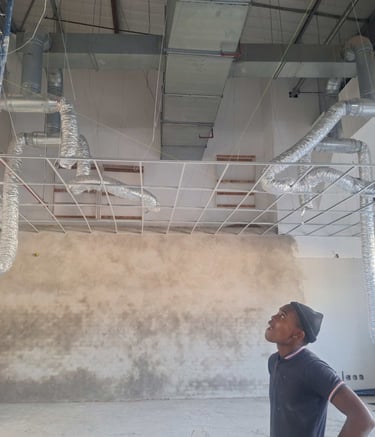 Start of installation of suspended ceiling grid work for commercial renovation project, Belair Shopping Centre, Randburg