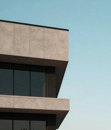 A sharp architectural detail of a modern, professional building exterior in rural Texas under a clear light blue sky. Minimalist and clean composition.