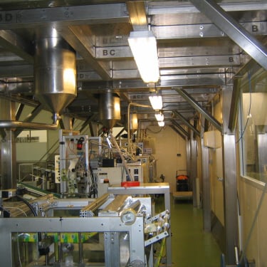 a room with stainless steel machinery