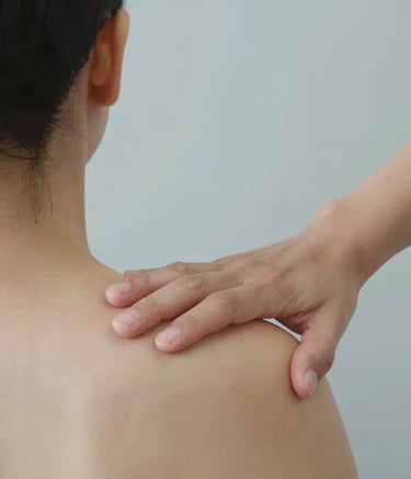 Close-up of a professional physiotherapist's hands performing manual therapy on a patient's shoulder. The lighting is soft and clinical, with a color palette including #A0CAC7 and #F5F8F7, conveying a sense of expert care and relief.
