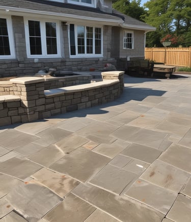 a patio with a stone patio with a bench and a bench