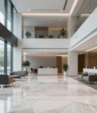 A wide, sophisticated view of a contemporary office foyer with polished marble floors and minimalist furniture. The color palette features #0D1B2A and #E0E1DD, creating a clean, forward-thinking atmosphere that inspires trust and professional excellence.