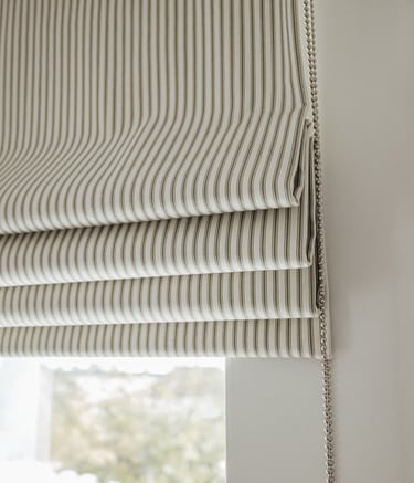 Custom motorized window blinds and rollers for modern living rooms