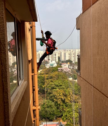 High rise apartment balcony pigeon nets in Vile Parle West area