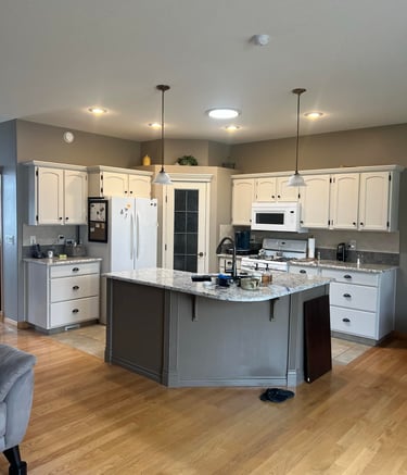 recently completed cabinet painting. refinished cabinets in innisfail