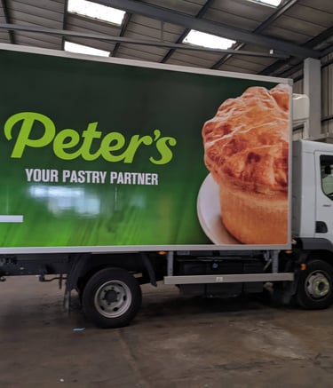 printed wrap and sign writing for a van fleet