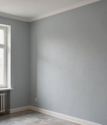 A professionally painted living room interior in an Anatolian home, showcasing smooth walls in a light clouds grey color. The lighting is soft and natural, coming from a large window, highlighting the flawless finish and meticulous attention to detail. No people present, focusing on the cleanliness and quality of the paint job.