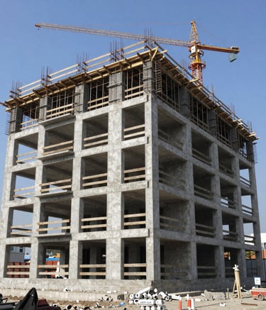 A sleek screenshot of the RG PVC ecommerce homepage with orange and blue branding.