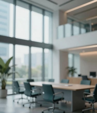 Modern corporate office building interior with a clean, sophisticated architectural design. Soft morning light filtering through large windows. Subtle inclusion of #3E5A73 tones in the furniture, reflecting a trustworthy and professional atmosphere.