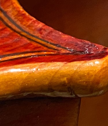 Jim Clinton Cello 2024 close-up of corner and edge detail