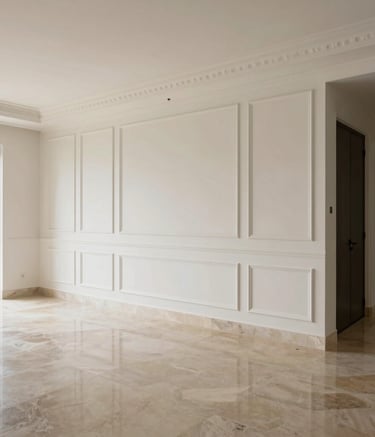 Architectural photography of a luxurious living room in Brazil featuring impeccably finished walls and polished stone flooring. The composition is clean and modern, with soft natural light reflecting off the high-quality construction finishes in shades of off-white and charcoal.