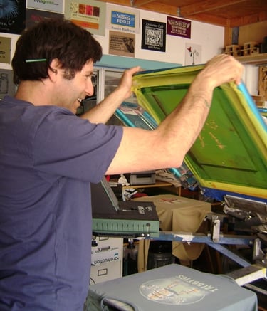 Earl Arnold at the Table Salt Design printing press.
