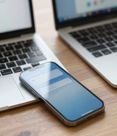A close-up of a high-end smartphone on a wooden desk next to a sleek laptop, displaying a communication app. The lighting is bright and natural. The scene features tones of #4A6E82 and #A6BFCC, reflecting a professional and innovative business environment.