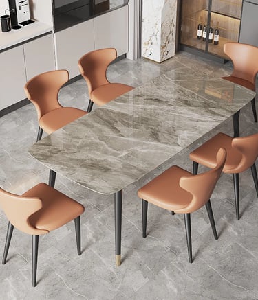 a marble table with chairs and chairs in a room