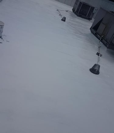 a flat roof with an American weatherstar waterproof roofing system 