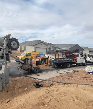 a cement mixer truck is parked in a lot