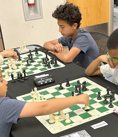 Children playing chess at a practice chess tournament at the Henderson Multi-Gen Rec Center in NV