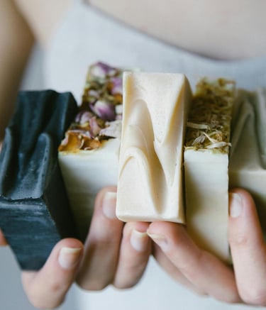 a woman holding a piece of food in her hands
