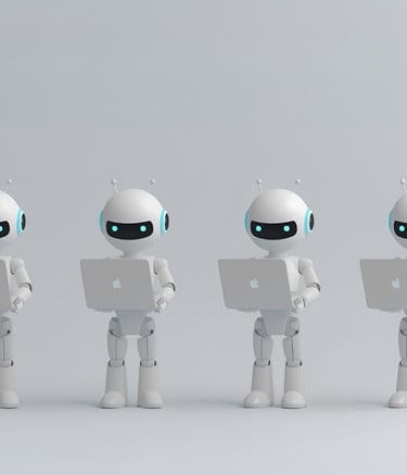 Row of small white robot figures working on laptops in a minimal studio.
