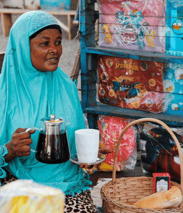 a woman in a blue hijab wearing a blue hijab