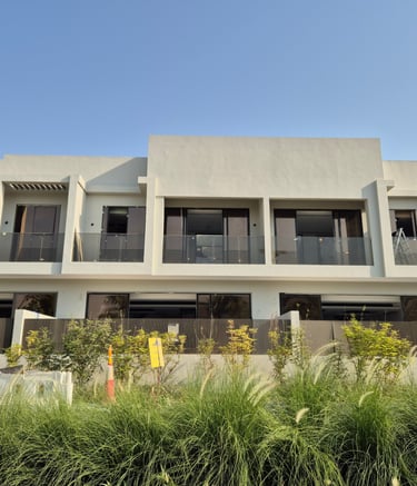 Luxury glass balcony railing with stainless steel fixtures for UAE villas
