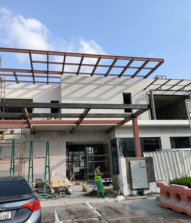 Structural steel framework fabrication and site installation for a modern villa elevation in Dubai.