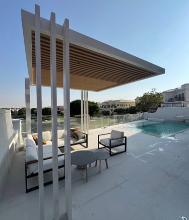 Water-resistant aluminum pergola and pool cabana for outdoor shade in Dubai.