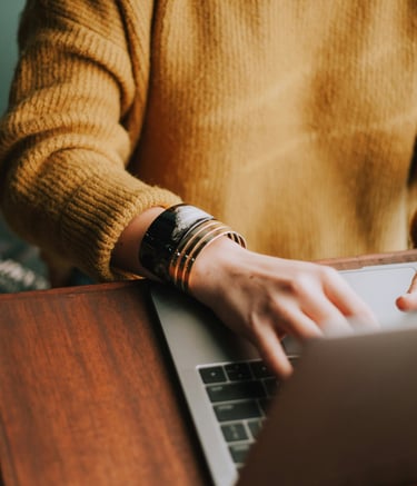Woman using laptop personal computer