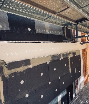 Rehabilitación de fachada con aislamiento térmico exterior