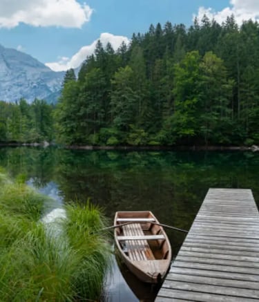 Floating dock on man-made natural lake surrounded by trees—designed to blend seamlessly with nature