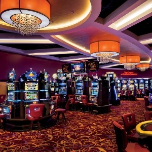 a casino room with a casino table and casino tables