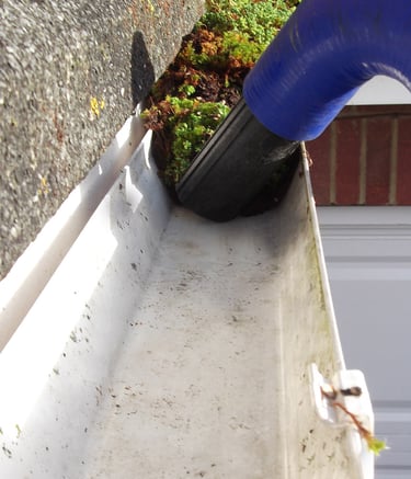 Gutter vacuuming