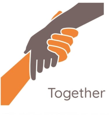 a hand holding green Way Association 