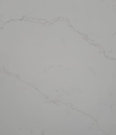 Bright white quartz countertop with clean, minimalist design