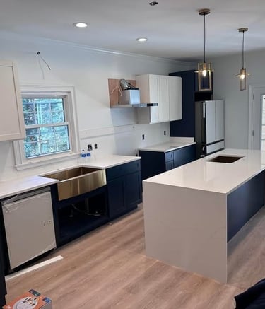 Modern kitchen with waterfall quartz island and matching edge