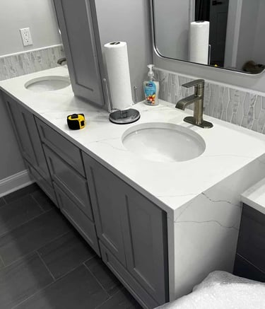 Waterfall edge design on custom stone countertop vanity