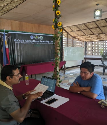 "Our consultant in discussion during a key informant interview KII Philippines"