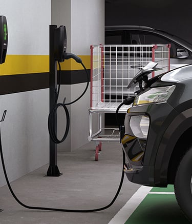 foto de carro eletrico sendo recarregado