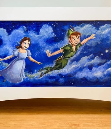 Toy chest hand-painted with whimsical characters and a midnight blue, starry sky."