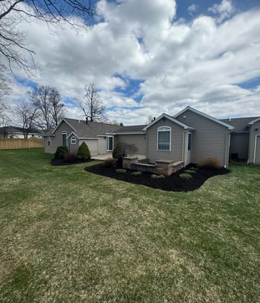 A freshly mulched garden bed