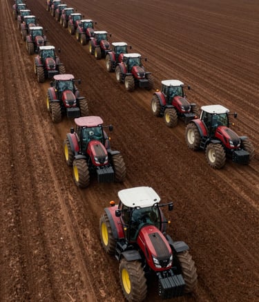 Aerial wide-angle photograph of a fleet of modern tractors working in a synchronized pattern on a massive Brazilian plantation, rich dark brown soil, professional lighting.