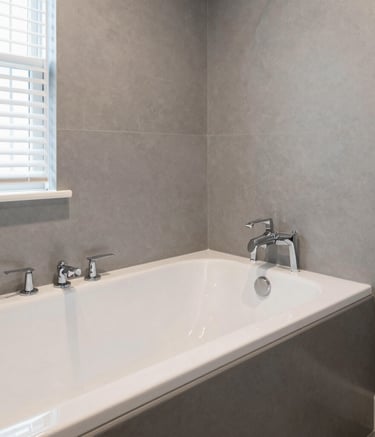 Elegant modern kitchen with sleek marble countertops and soft natural lighting