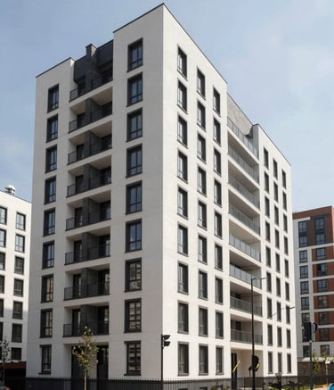 A wide-angle professional photograph of a modern residential development in Bratislava, Slovakia, showcasing precise architectural lines and high-quality materials. The lighting is bright and natural, reflecting a trustworthy and refined construction aesthetic.