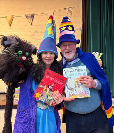 Korky Paul with Winnie the Witch at book signing